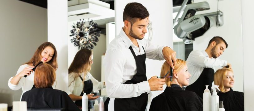Girl cuts hair at the hair salon
